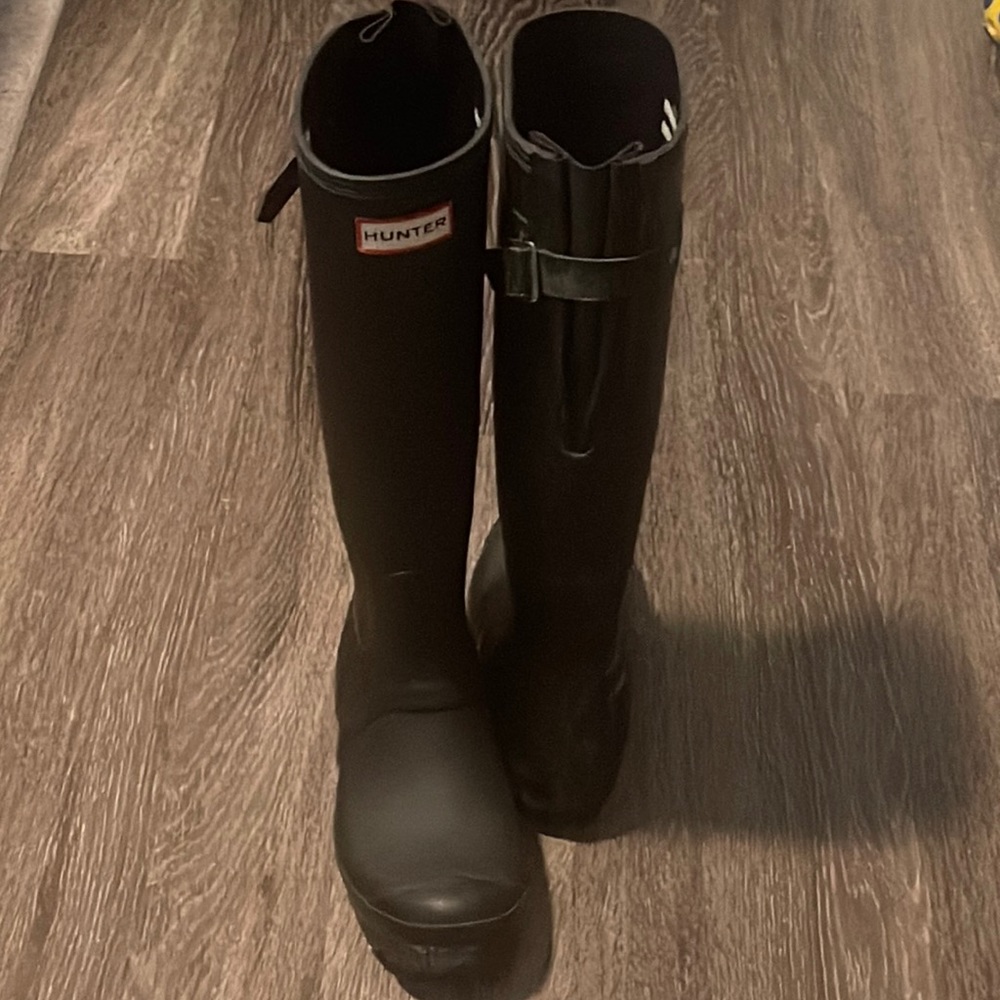 Tall hunter rainboots with adjustable calf.